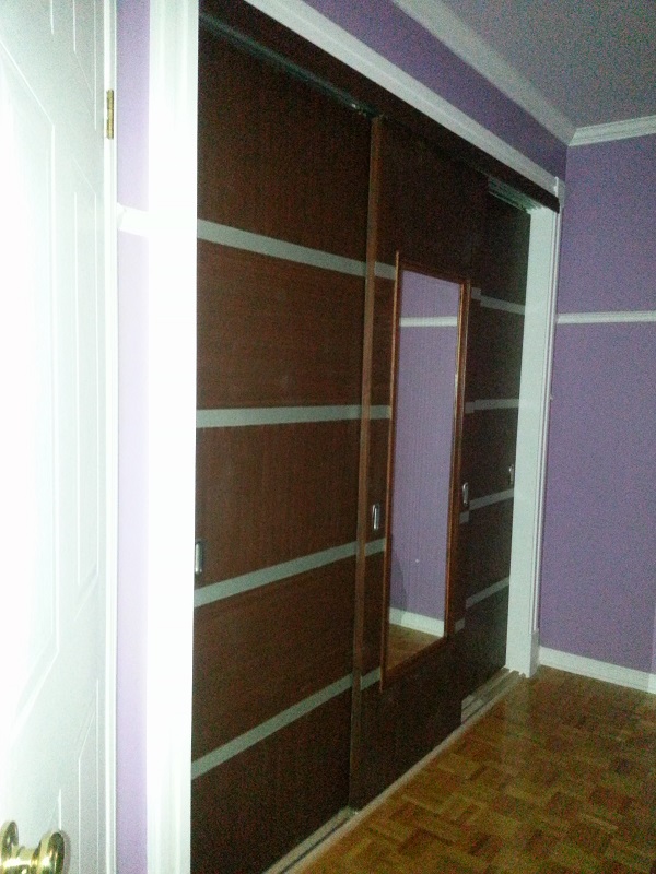 Closing all three sliding closet doors 